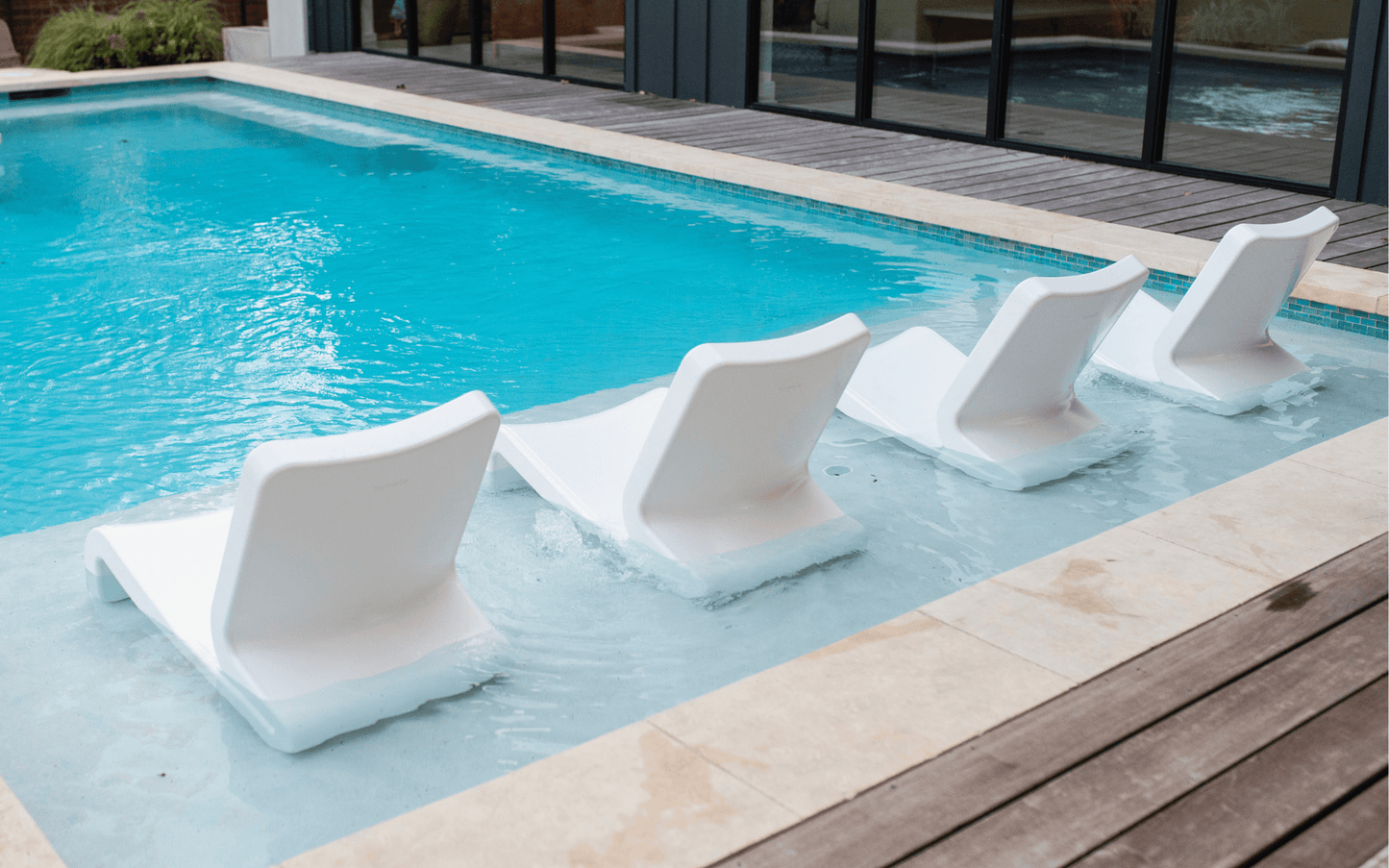 Line Lounge Chair - Tupelo Goods - In pool White Modern Lounge Chairs Group of 4