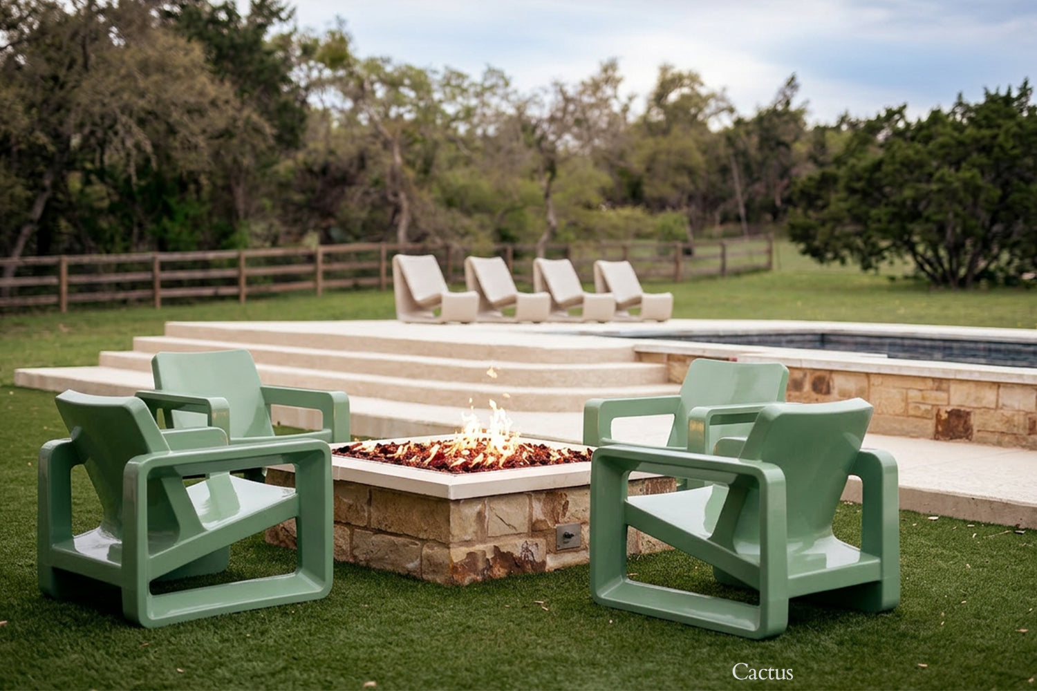 Tupelo Deck Chair Cactus sitting around a fire pit 
