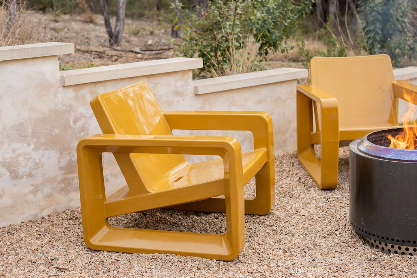 Tupelo Deck Chair Marigold sitting around a fire pit