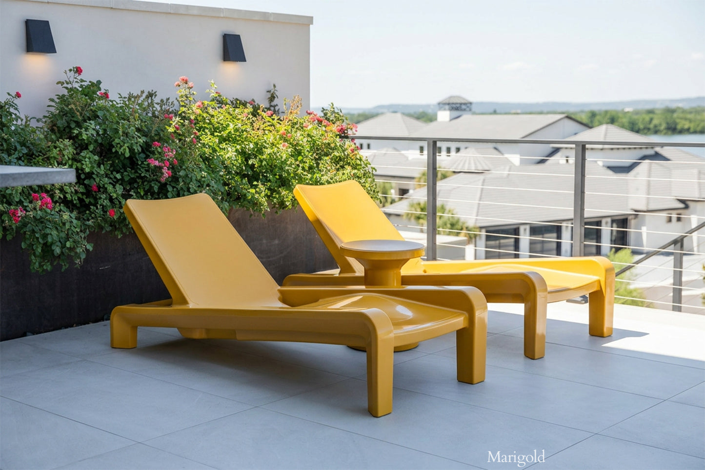 Tupelo Deck Chaise Marigold and Fluent Side Table Marigold on a patio