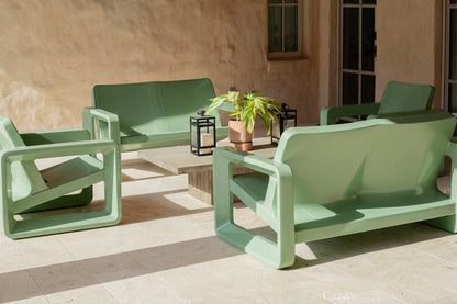 Tupelo Deck Loveseat Cactus and Deck Chair Cactus on a back patio