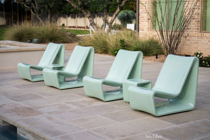 Tupelo Loop Chair Sea Glass sitting poolside