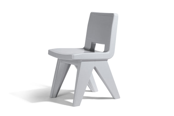 The image shows an angled, modern Concrete Gray coloured Fresco Dining Chair made with resin, in front of a white background.