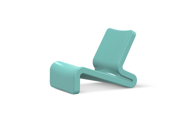 This image shows the modern Line Lounge Chair in the colour Seafoam Green made with resin, in front of a white background.