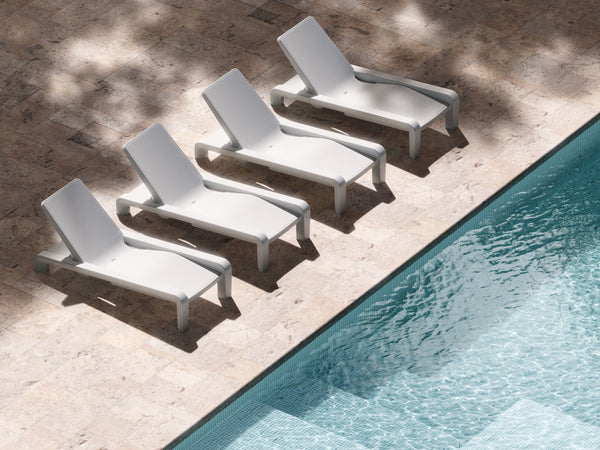 Image of the Deck Chaise Loungers in Highcloud White poolside. Made from marine-grade polyethylene to withstand all elements. 