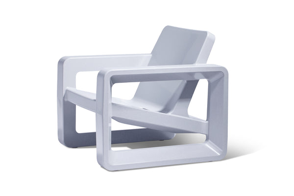 Image of a modern, minimalist Deck Lounge Chair in the colour Concrete Gray made with resin displayed on a white background.