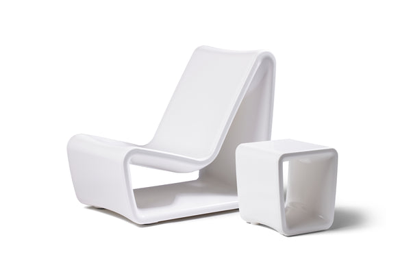 Image of an angled Highcloud White Loop Lounge Chair paired with the Highcloud White loop Table, shown on a white background.