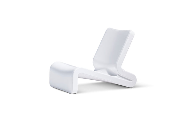 Image of the Highcloud white Line Lounge Chair made with resin, shown at an angle, displayed in front of a white background.
