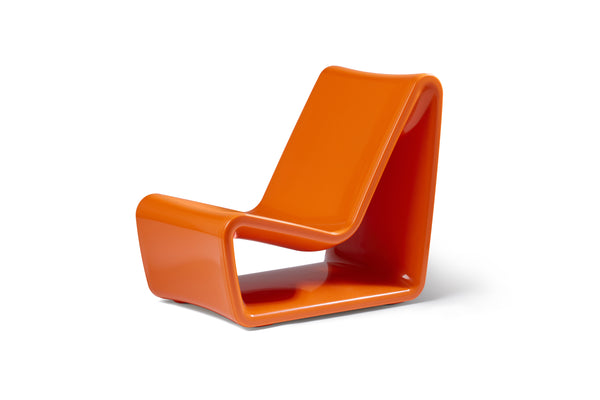 Image of an angled side view of the Vintage Orange Loop Lounge Chair made with polyethylene, shown on a white background.