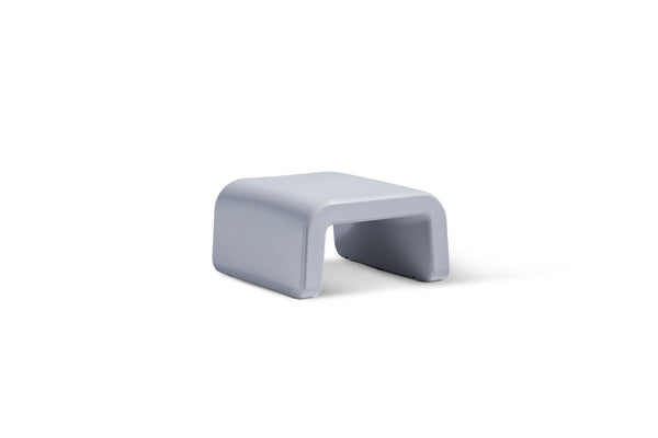 Image of the waterproof Line Ottoman in the colour Concrete Gray made with polyethylene displayed on a white background.